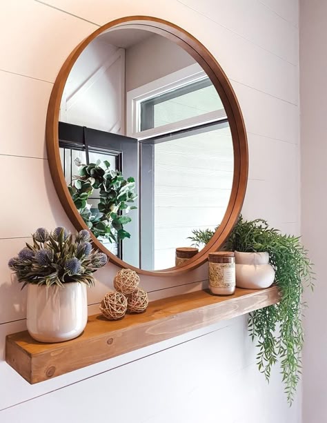 Small Kitchen Ideas on a Budget Circular mirror behind floating shelves