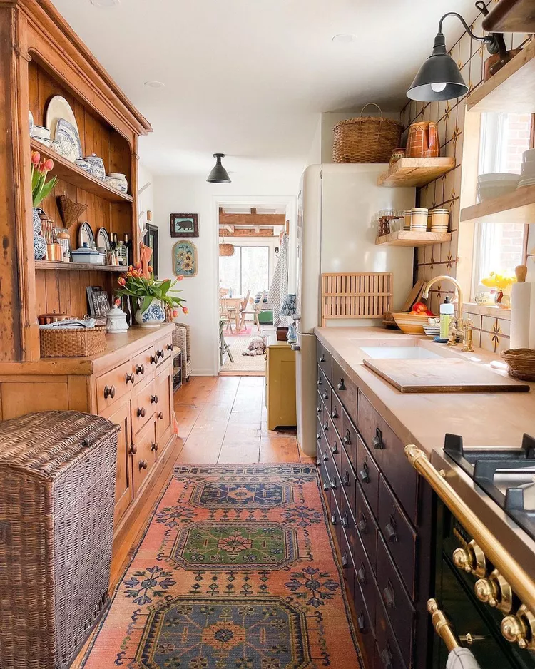 Small Kitchen Ideas on a Budget Red Persian-style rug under a bistro table